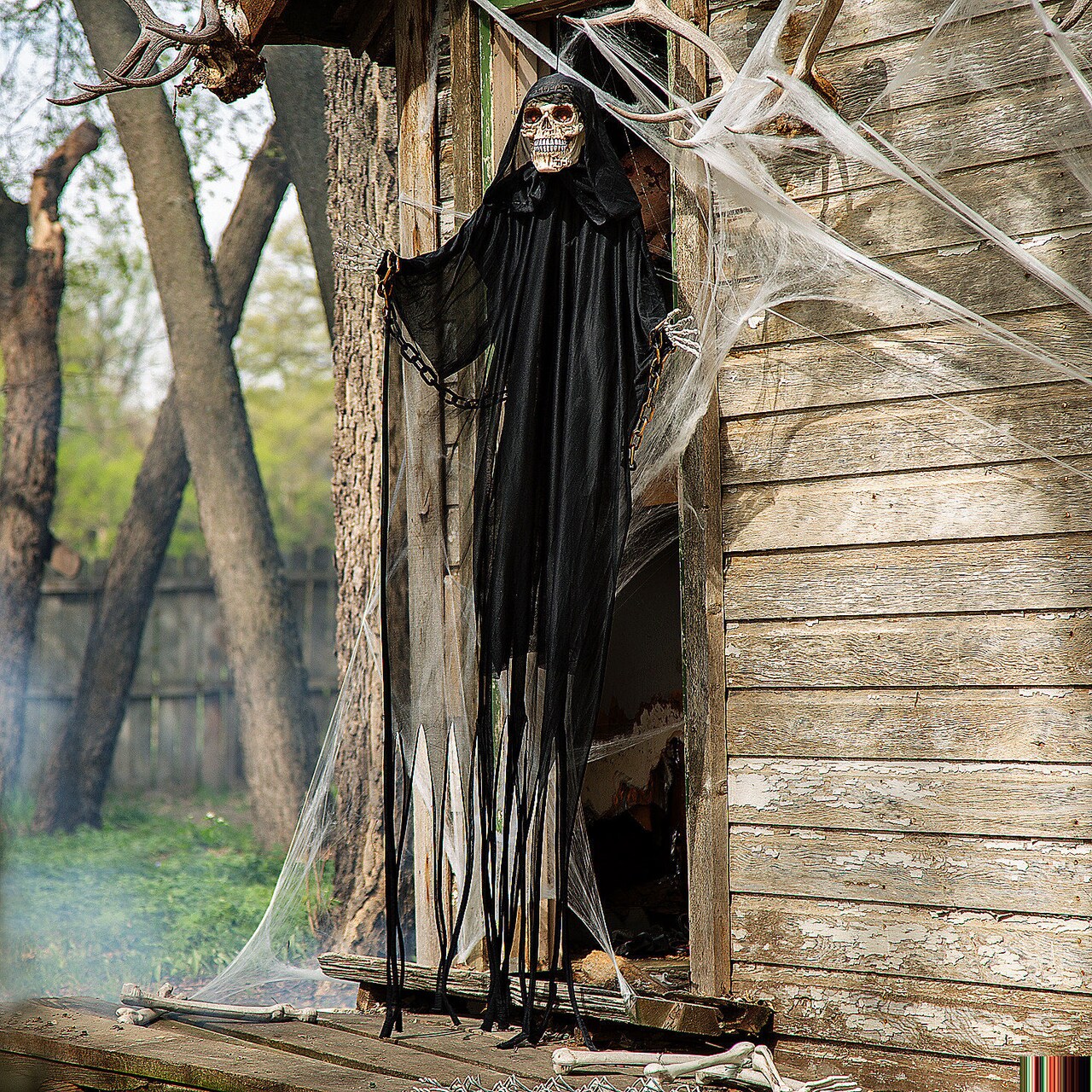 Animated Hanging Chained Grim Reaper Plastic Halloween Decoration 6 Ft